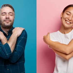 Man and woman hugging themselves